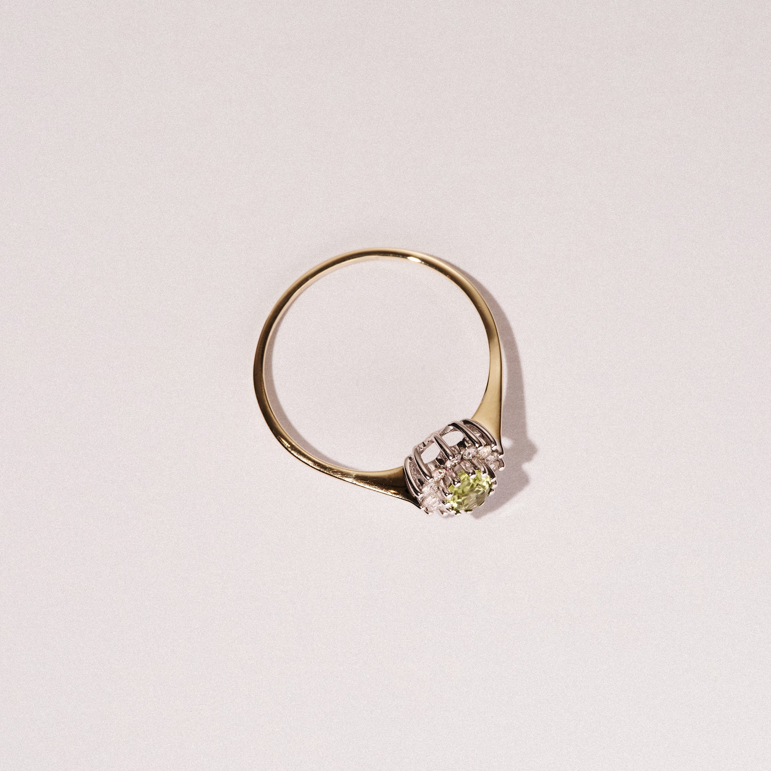 Peridot 5 x 3mm And Diamond 9K Yellow Gold Ring
